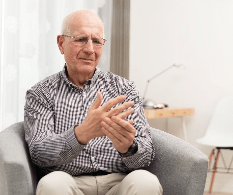 Senior man with Arthritis holding hand in pain